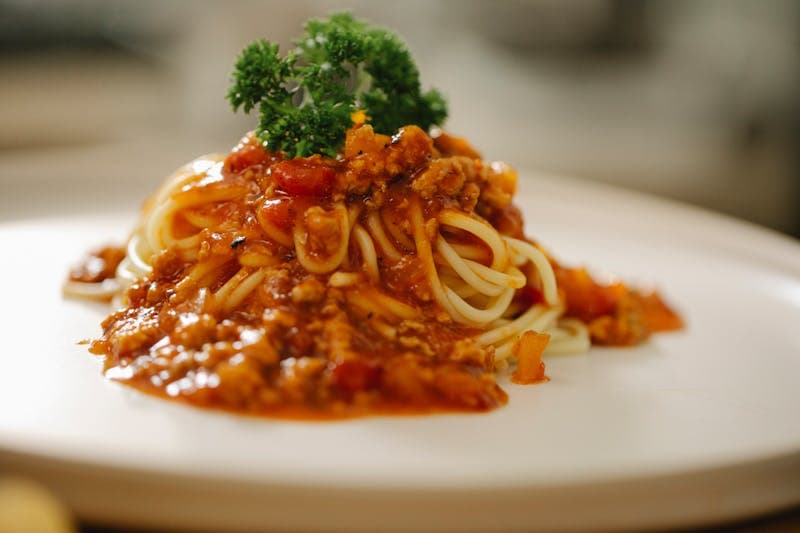 A pan of slow-cooked tomato sauce